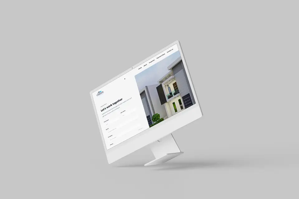 Monitor showing the Pasilier contact page, Let’s work together.